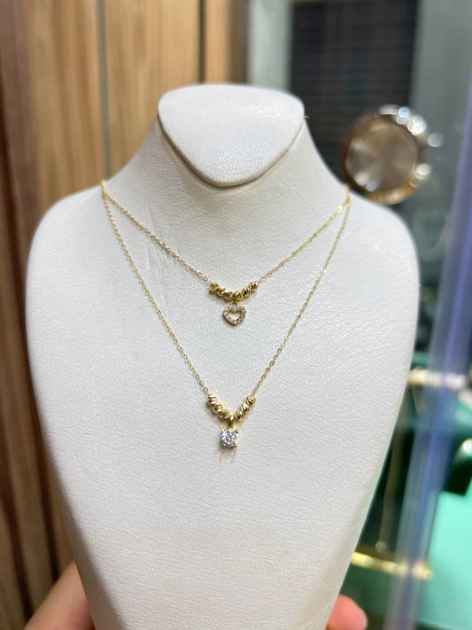 Collier en or 18k double très chic et moderne coeur et gaute avec boulles en or 18k